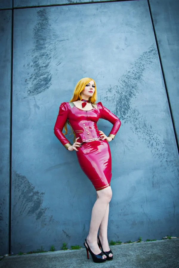 Military-Inspired Plum Latex Jacket with Decorative Buttons and Gold Trim