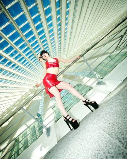 Sleek Red Halter Latex Skirt with Ruffle Hem