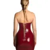 Close-up view of the intricate lace-up back detail on the red latex dress