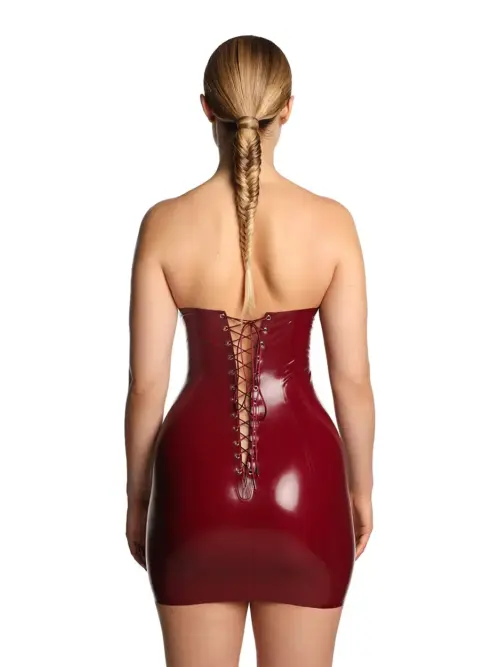 Close-up view of the intricate lace-up back detail on the red latex dress
